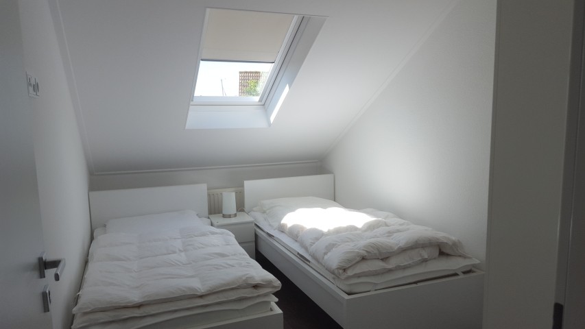 Schlafzimmer mit 2 Doppelbetten