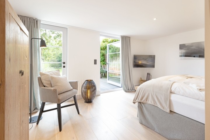 Schlafzimmer eins im EG mit Bad en Suite