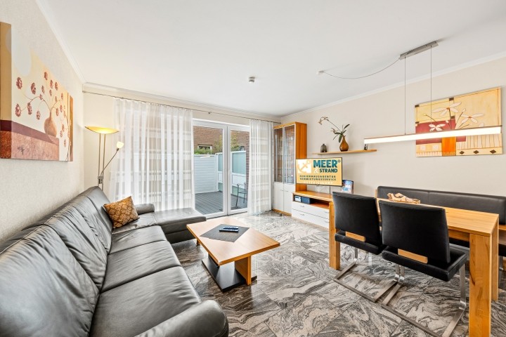 Wohnzimmer mit integriertem Küchenbereich