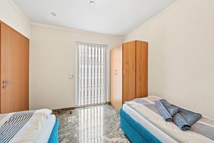 Schlafzimmer mit 2 Einzelbetten