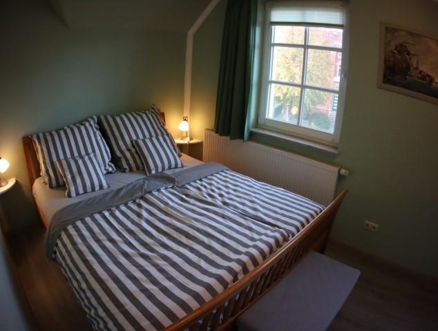 1.OG: SZ mit Doppelbett 180x200 mit Hopper