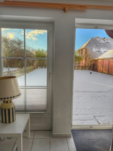 Blick aus dem Wohnzimmer,Rückseite 1,50 m hoch eingezäunt