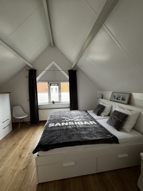 Schlafzimmer 1 DG Doppelbett