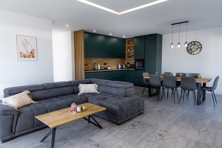 The living room sofa easily converts into an extra bed, accommodating additional guests.