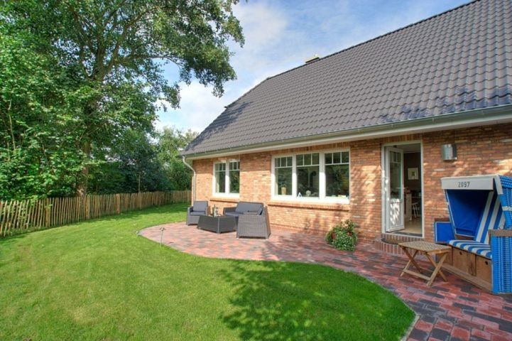 Ferienhaus mit Zaun 
