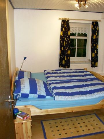 Elternschlafzimmer mit Doppelbett