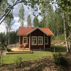 Ferienhaus Tassgården im schwedischen Wald, eingezäunter G ...