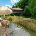 Auszeit direkt am Fluss Freistehendes Ferienhaus mit umzäunten Garten